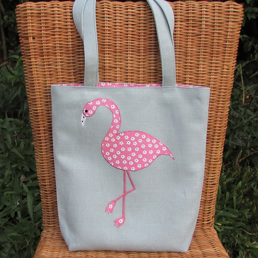 Flamingo tote bag in pale blue with pink and white floral print flamingo