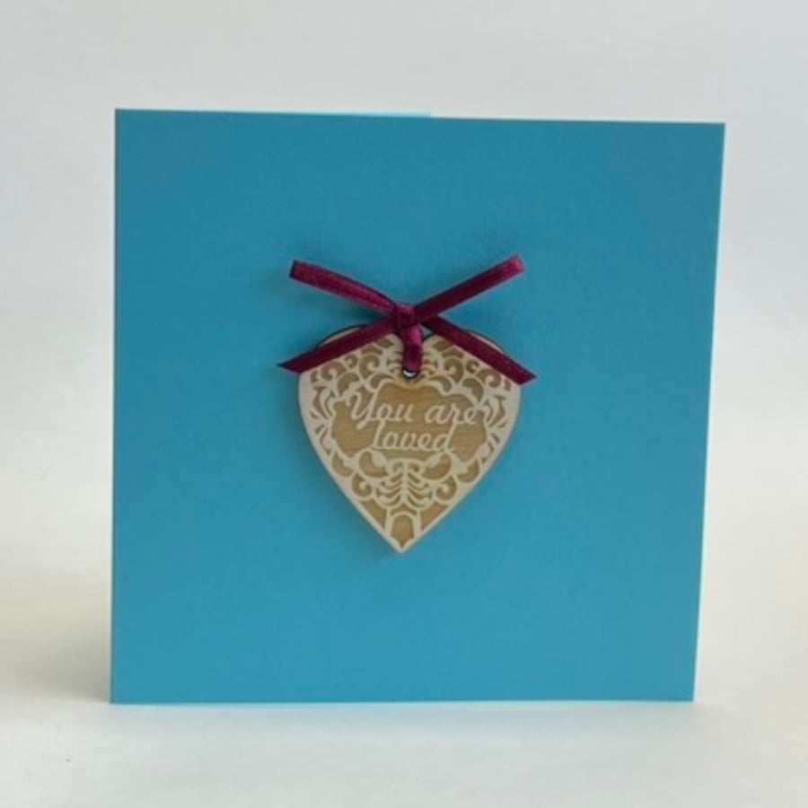 'You are loved' card with detachable decoration