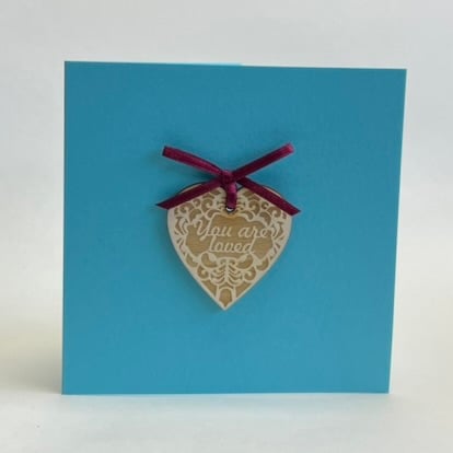 'You are loved' card with detachable decoration