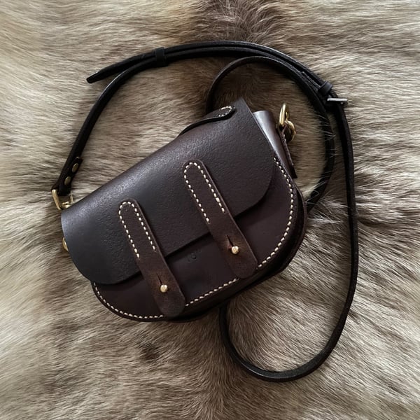 Brown leather mini satchel bag, made from an up-cycled horse saddle.