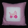 Nursery  cushion with pink pram applique