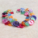 Dainty rainbow button bracelet on silver plated chain with toggle clasp 