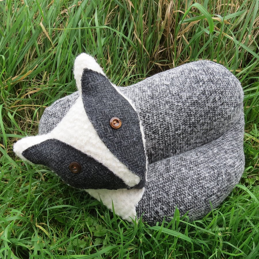 A soft and tactile woollen badger cushion.  Woodland decor.