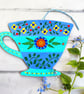 Hand painted wooden teacup hanging with flowers, blues and greens, kitchen decor