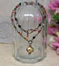 Multicoloured agate necklace with copper wirework and glass pendant  - Image 1