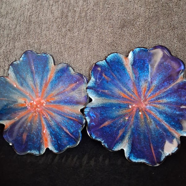 Set of two handmade epoxy resin flower coasters. Blue, pink and silver shimmer.