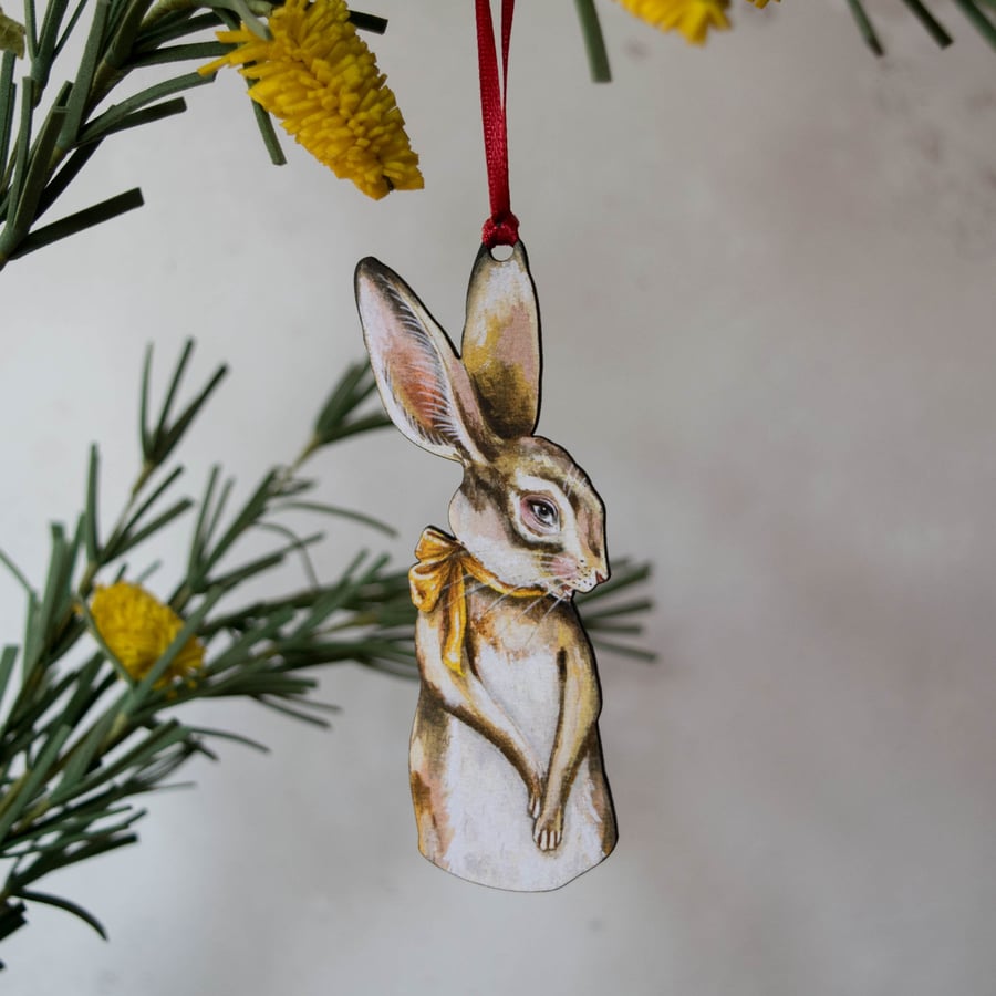 Wooden hare hanging decoration. Easter decoration