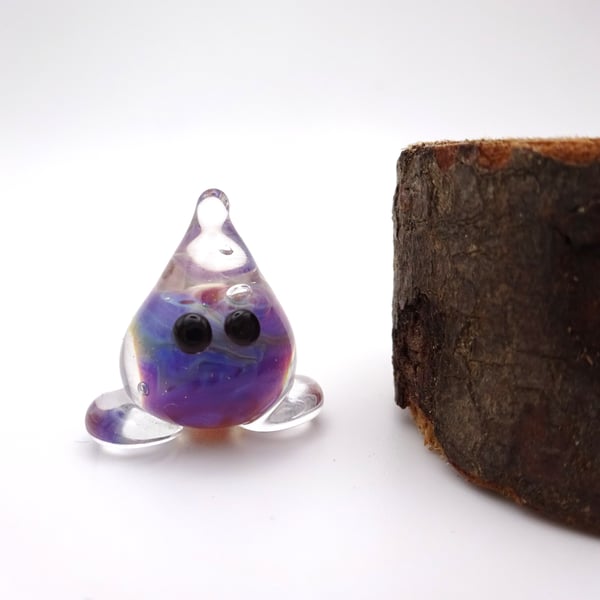 small glass wisp figure