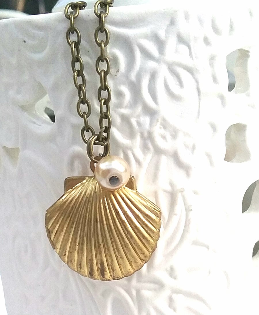 Brass Shell Locket.... 