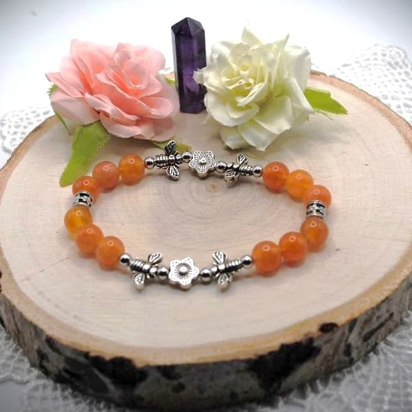 Sunstone Bees and Flowers Stretch Bracelet. Postage included.