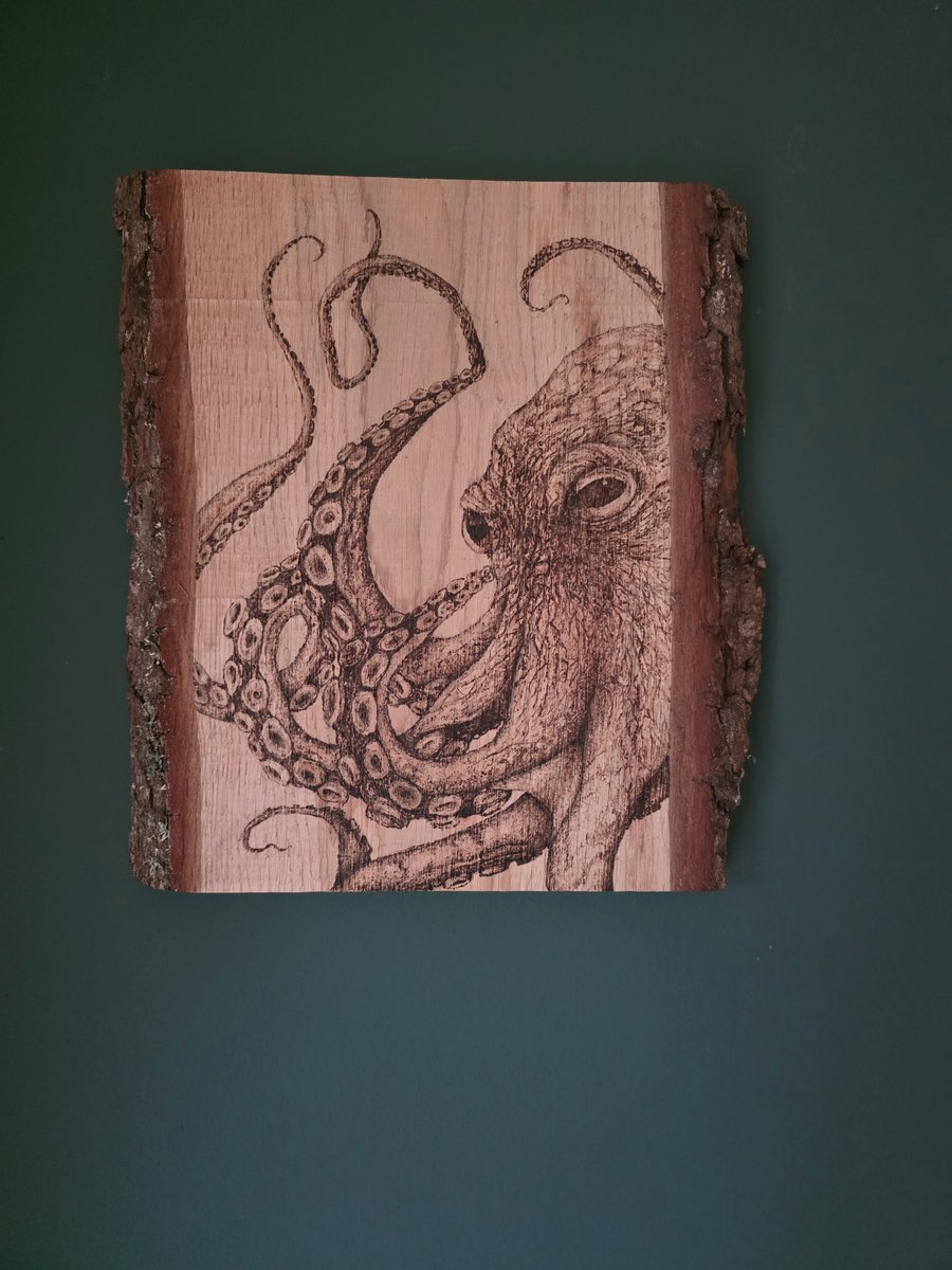Octopus pyrography on live edge board