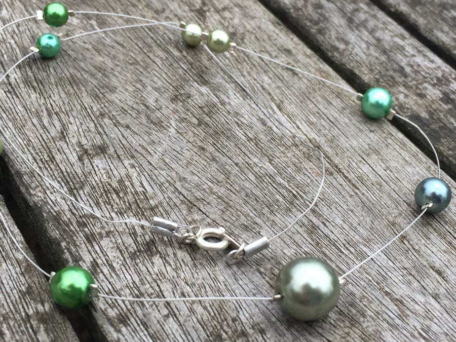 Green pearls illusion necklace