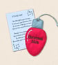 A Family's Light Christmas Tree Decoration - Light Bulb Ornament