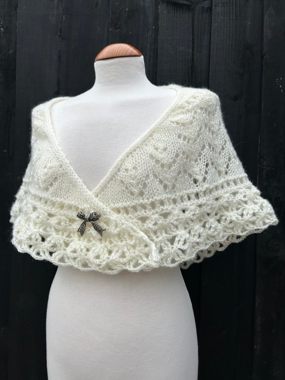 Hand knitted light cream shallow triangle lace shawl with crochet edging 
