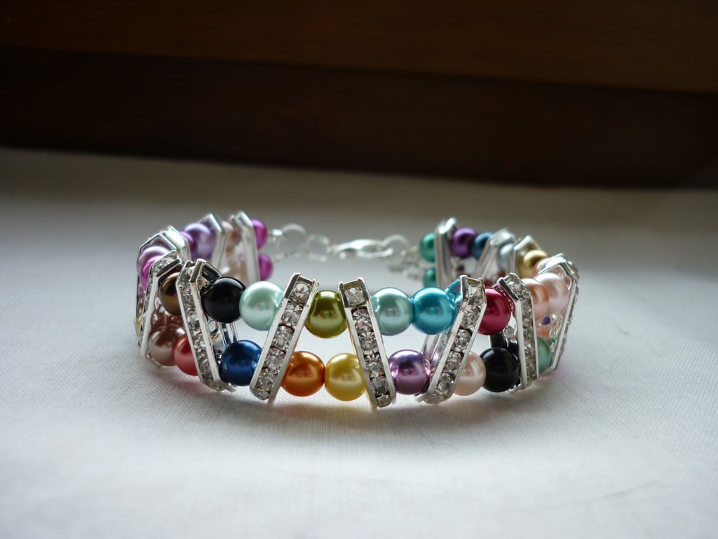 MULTI COLOURED AND SILVER RHINESTONE BAR BRACELET.  867