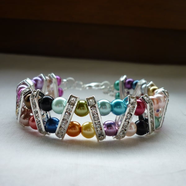 MULTI COLOURED AND SILVER RHINESTONE BAR BRACELET.  867