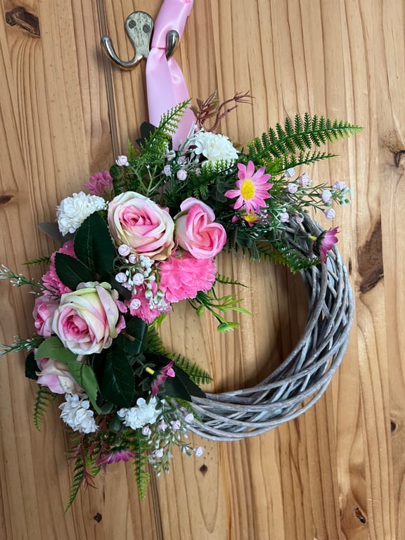 Pink wicker door wreath