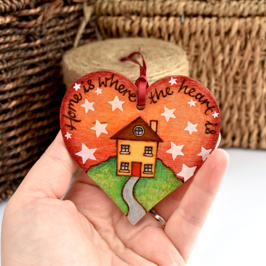 Home is where the heart is. Pyrography hanging heart decoration with colour. 