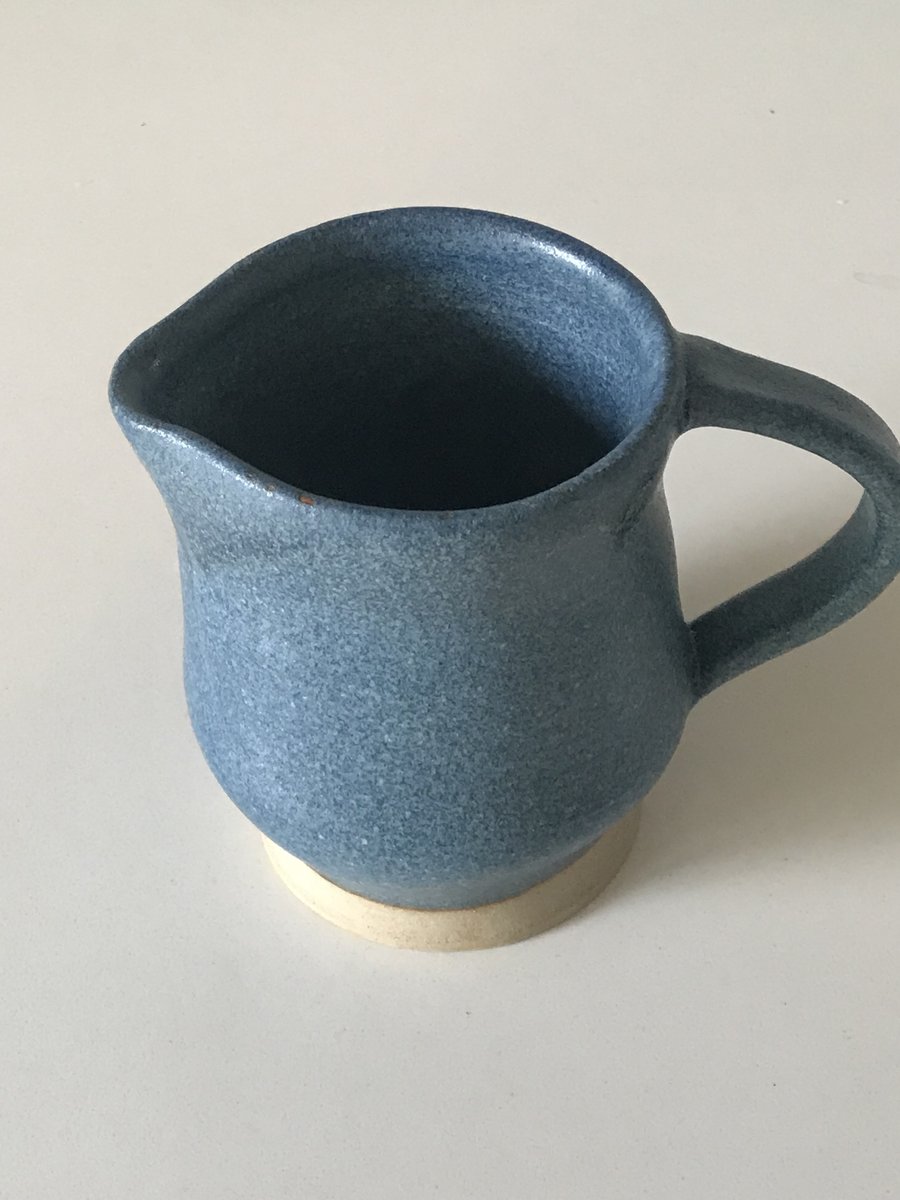 Stoneware pottery jug, denim blue glaze.