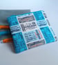 Clifton Express Zipped purse with vintage travel theme - bus and train tickets