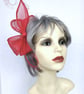Fuchsia pink fascinator bow with feathers and beads