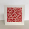 Holly linocut Christmas card, red