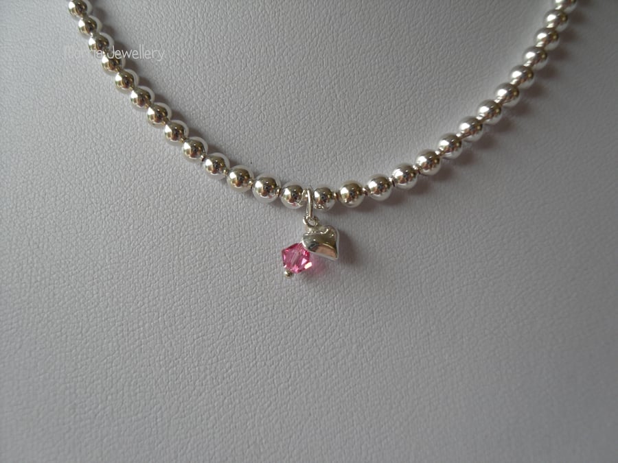 Sterling Silver and Crystal Necklace With Charm