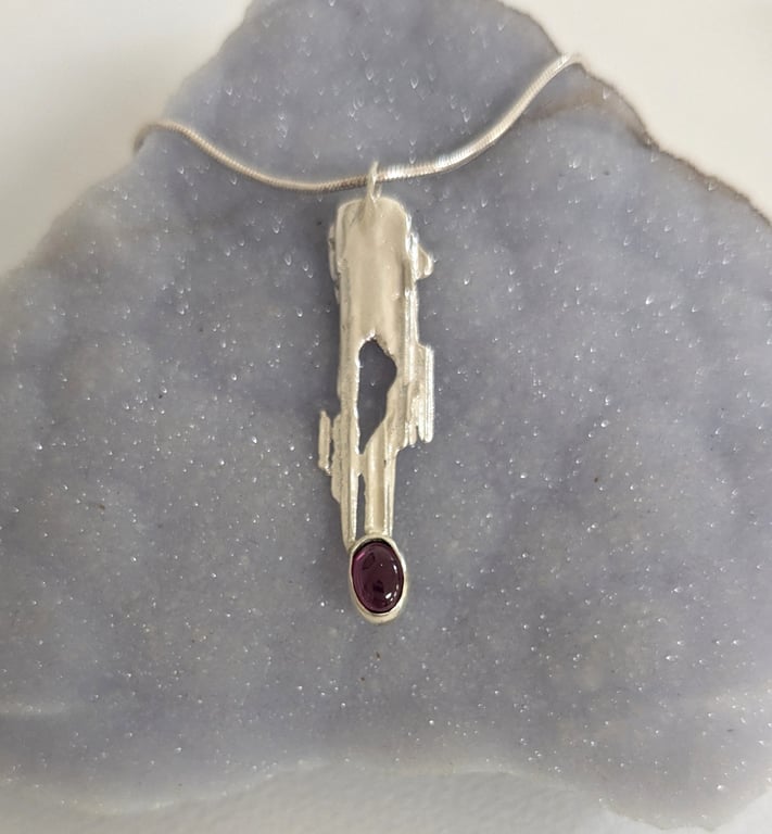 Rippled Sterling Silver Garnet Pendant on a Silver Necklace