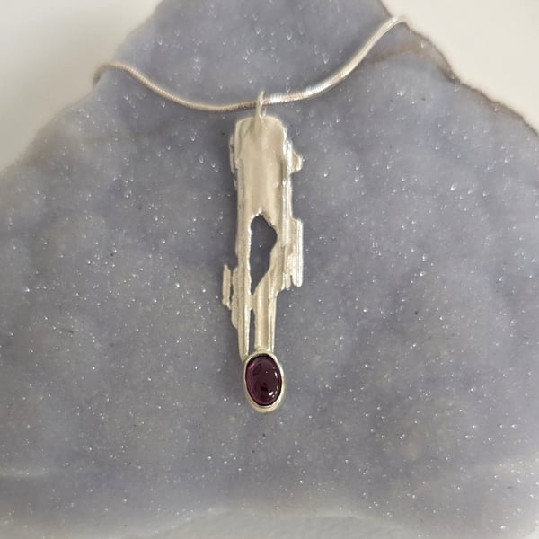 Rippled Sterling Silver Garnet Pendant on a Silver Necklace