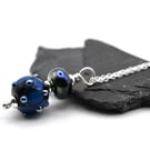 black and metallic blue bump pendant necklace