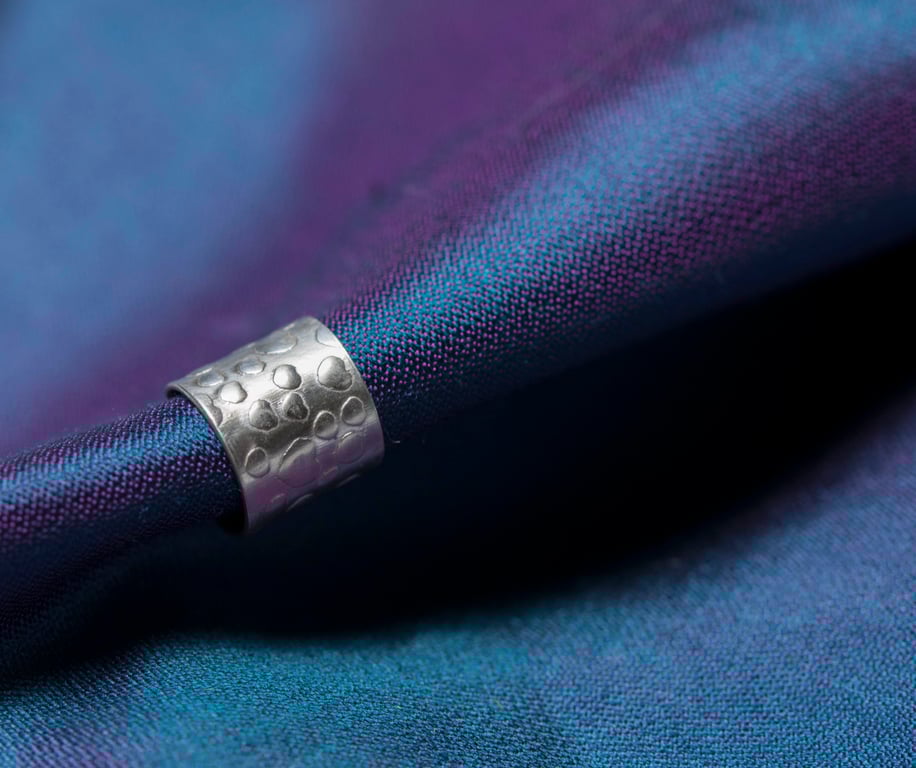 Chunky ear cuff with a "little hearts" pattern