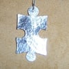 Jigsaw pendant in sterling silver
