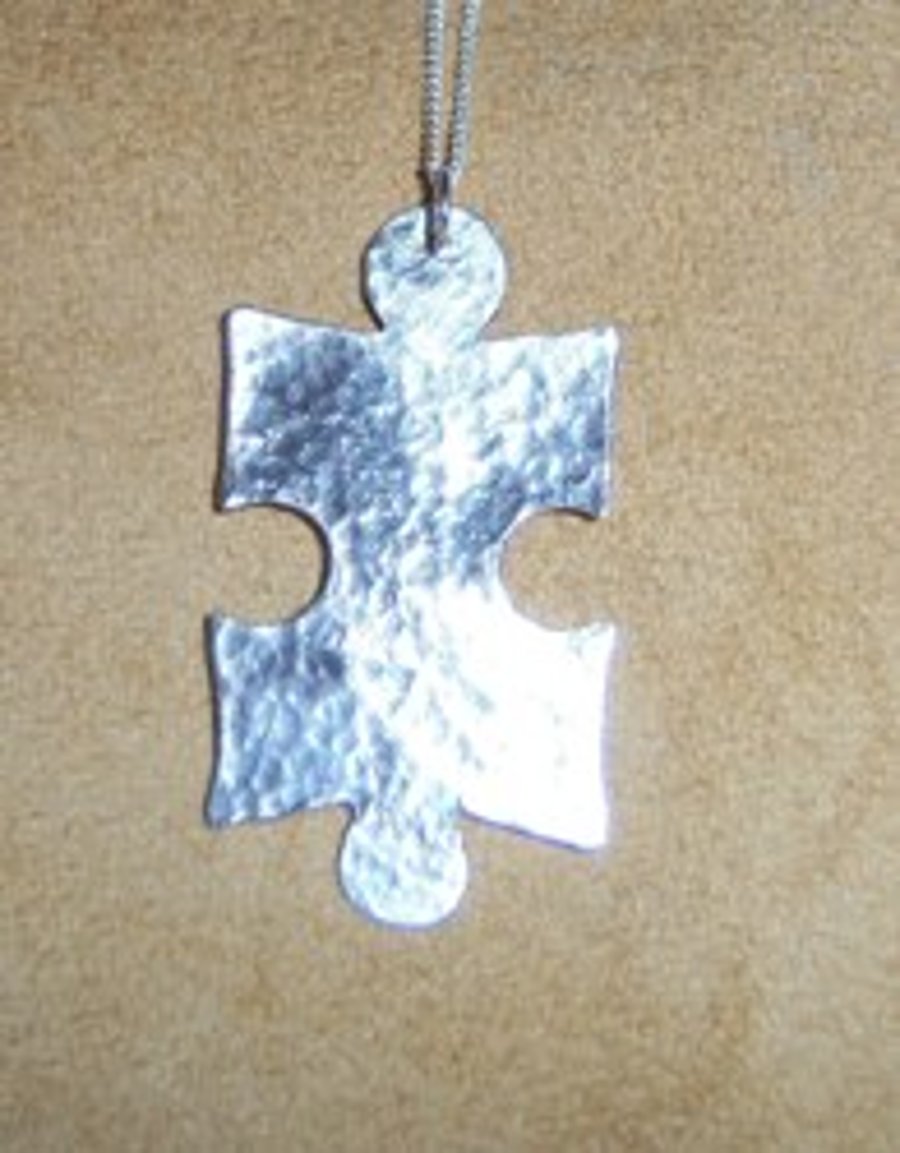 Jigsaw pendant in textured sterling silver