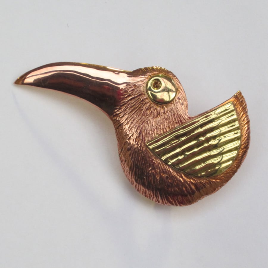carved copper bird