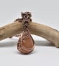 Peach Moonstone and Copper Wire Wrapped and Woven Pendant - Image 1