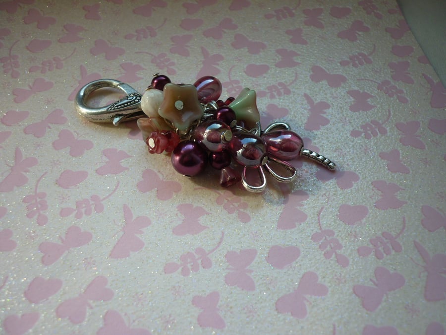 SHADES OF PINKS AND SILVER BEADS  DRAGON FLY BAG CHARM.