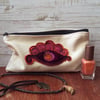 Embroidered zipped canvas make up bag, pencil case or jewellery bag.