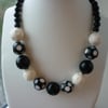 CHUNKY BLACK AND CREAM NECKLACE.  428