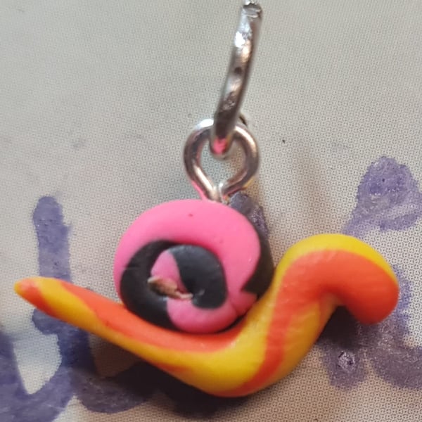 Cute snail charm pendant.