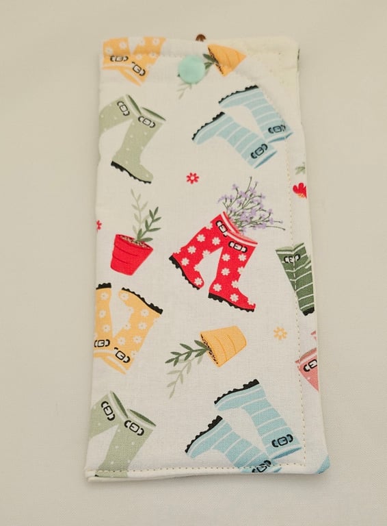 Wellingtons and garden themed cotton fabric glasses case.