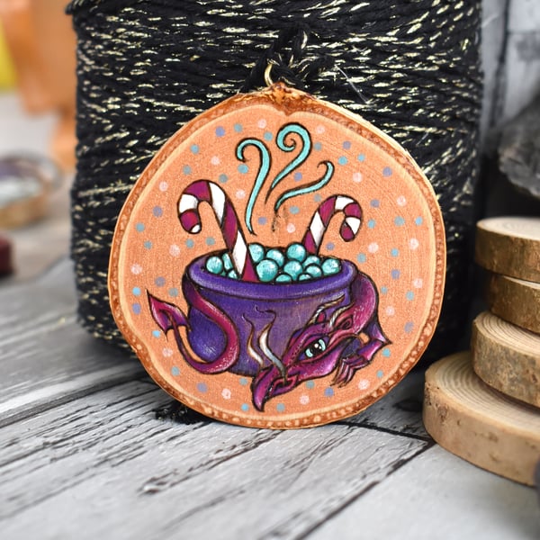 The candy cane cauldron dragon pyrography hanging wood slice decoration