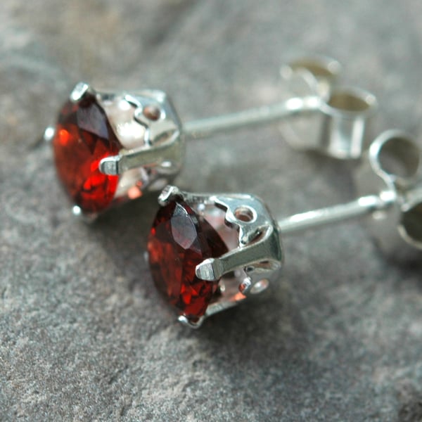 Faceted Garnet and Sterling Silver Stud Earrings. January birthstone.