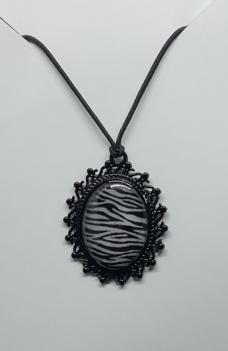Zebra  patterned pendant 