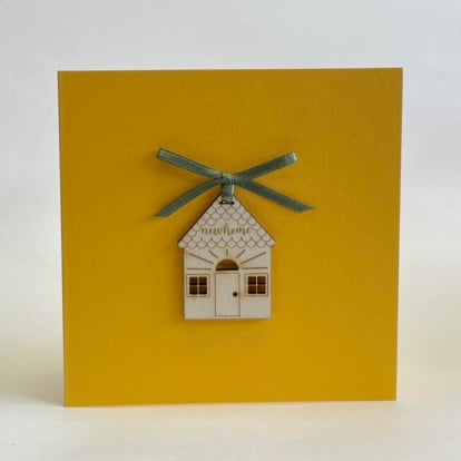'New home' card with detachable decoration
