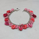 Pink and red button bracelet with heart toggle clasp 