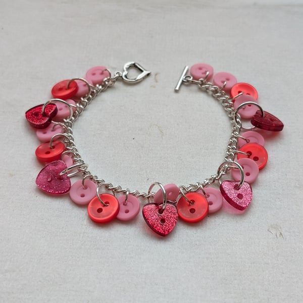 Pink and red button bracelet with heart toggle clasp 