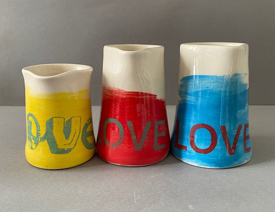 Set of 3 ceramic love pourers.