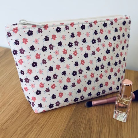 Make up bag, small toiletry bag, water resistant lining, in pink floral design