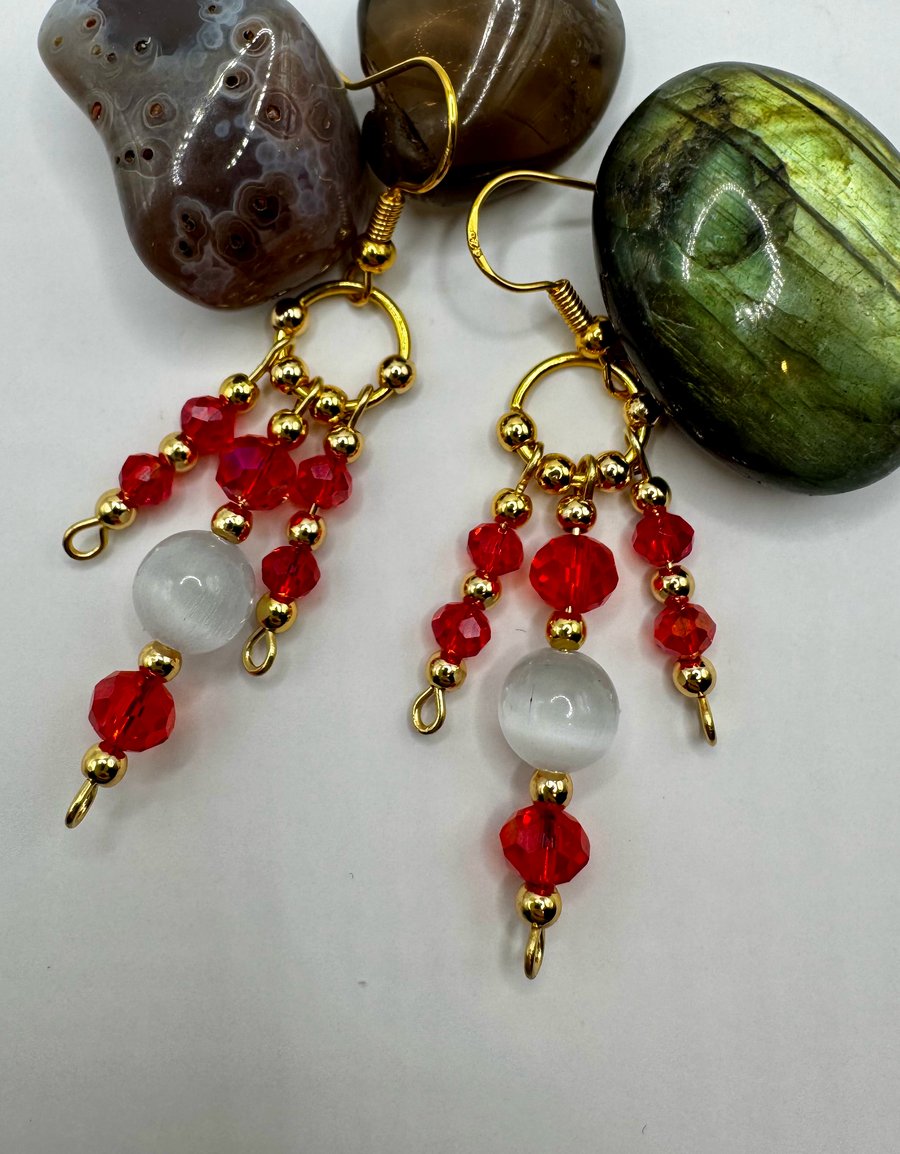 Red crystal and white cat eye stone earrings 