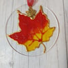 Maple leaf sun catcher decoration. 